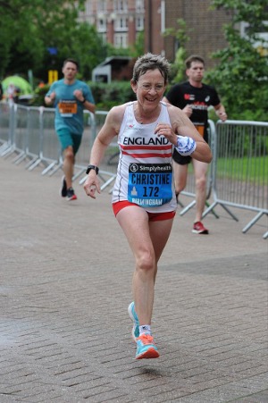 Chris Bexton competing in an England Masters vest at Birmingham 10k 2019