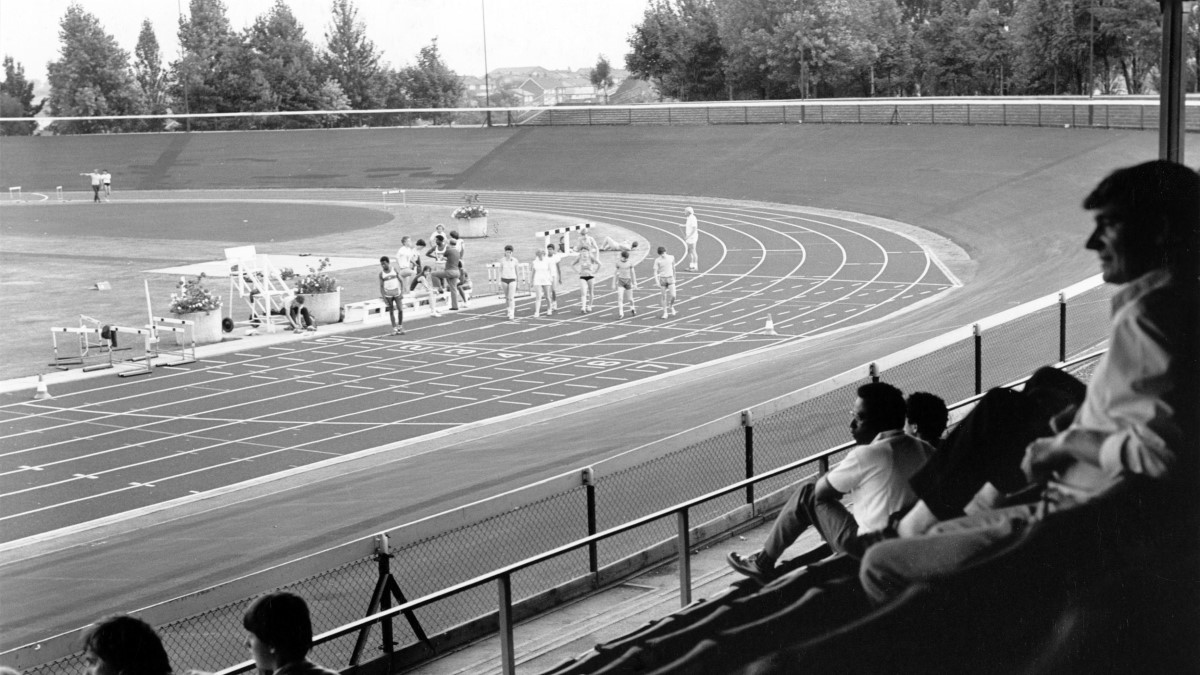 Harvey Hadden stadium Nottingham a view from the stand of the athletics track and banked cycle track around it.