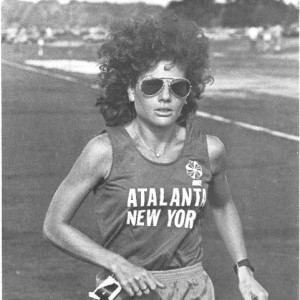 Marcy Schwam competing in the second Edward Payson Weston Six Day Race in 1981 wearing a vest with the wors Atalanta New York